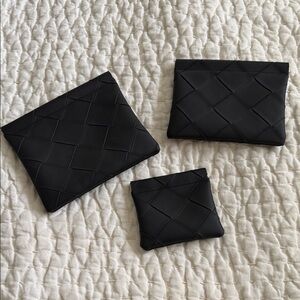 Elegant Black Makeup Pouches - Source Unknown